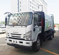 Camion de transport de déchets diesel ISUZU 4X2, capacité 7CBM/6m³, transmission manuelle, compacteur, moteur et boîte de vitesses intégrés