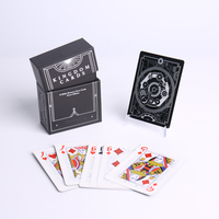 Cartes à jouer en PVC noir de luxe avec logo personnalisé d'usine, jeu de poker de luxe durable et étanche pour un usage familial