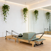 Machine de Pilates Reformer en bois de chêne pour l'entraînement en studio et les exercices à domicile, pliable, portable, réglable, facile à ranger