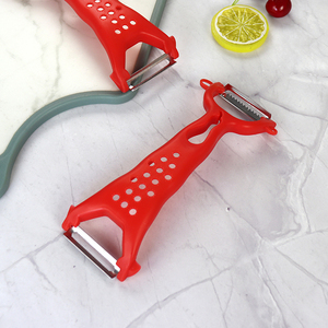 Eco-Friendly Manual Plastic Double Head <b>Fruit</b> & <b>Vegetable</b> Peeler with Stainless Steel Blades for Garlic & Ginger Grinding - Product Image 1