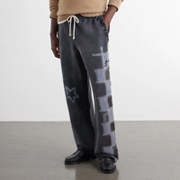Pantalon de survêtement ample et large pour homme, avec bords effilochés, imprimé par pulvérisation, taille à cordon, style vintage délavé, streetwear, effet usé