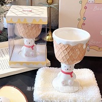 Ensemble adorable de théière et de deux tasses à dessert de style dessin animé avec un support en forme d'ours