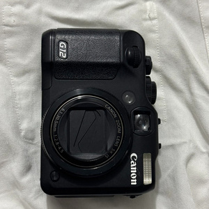 กล้องมือสอง Canon PowerShot G12 10MP เซ็นเซอร์ CCD 1/1.7 นิ้ว ซูมออปติคอล 5 เท่า กล้องวีล็อกขนาดกะทัดรัด - Product Image 1