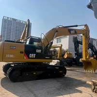 Excavatrice CAT 323D2L de 20 tonnes, grande benne, moteur puissant, pour travaux lourds de terrassement sur sites montagneux boueux, engin de construction