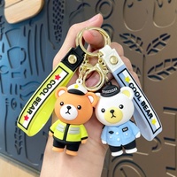 Nouveau design porte-clés en PVC imitation ours, pendentif souple en PVC ours pompier ou policier, breloques animaux 3D en PVC pour décoration