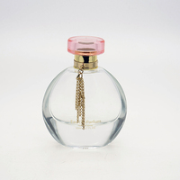 Bouteille de parfum d'épaisseur lourde de 50ml bouteille de parfum en verre ovale transparente de conception spéciale mignonne pour les femmes avec la boîte-cadeau de forme de livre