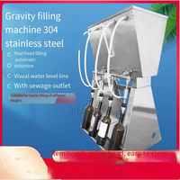 Machine de remplissage par gravité à 4 becs pour vins, spiritueux et jus de fruits dans des bouteilles en verre ou en plastique