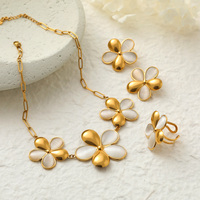 Set Perhiasan Bunga Batu Mata Kucing Baja Anti Karat untuk Wanita, Gaya Liburan, Kalung Liontin Bunga, Gelang, Cincin, Grosir