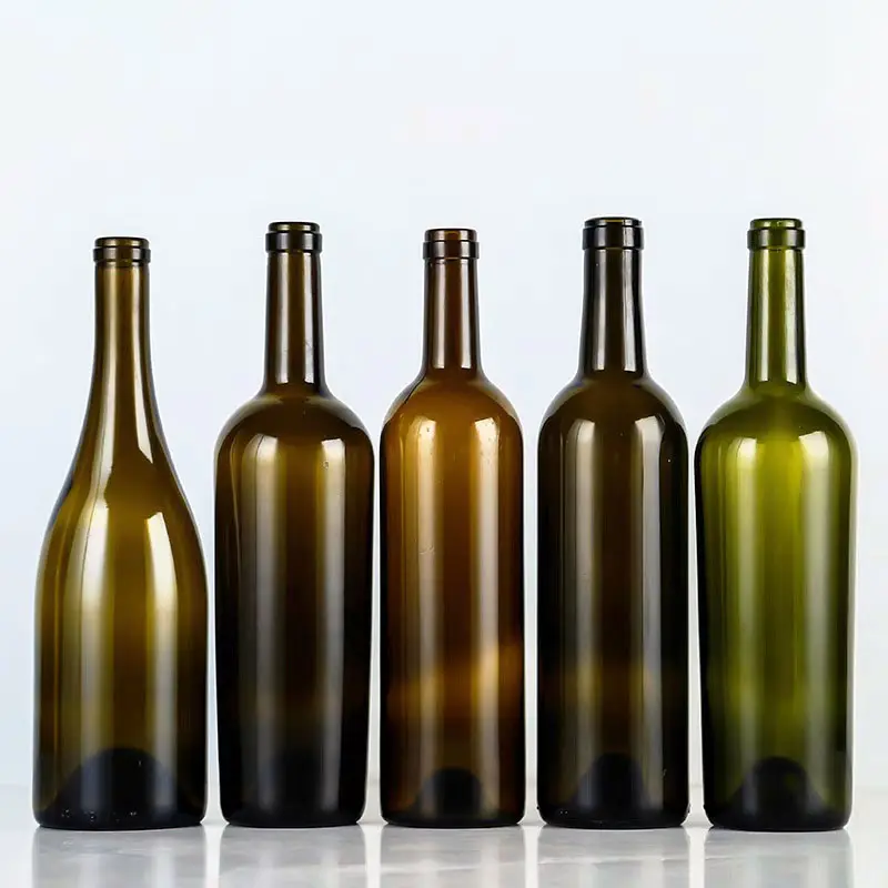 Venta al por mayor 500ml750ml botella de vino tinto verde oscuro vacío fabricantes de lujo champán Burdeos botellas de copa de vino vacías