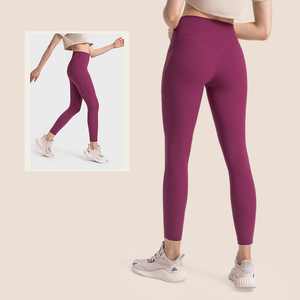 Leggins deportivos sólidos desnudos con logotipo personalizado para mujer, pantalones de Yoga transpirables de cintura alta de secado rápido con bolsillos - Product Image 1