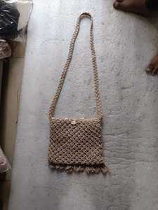 Sac bandoulière beige en crochet avec fermeture boutonnée et accent pompon pour les voyages décontractés - Product Image 4