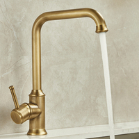 Robinet de cuisine STOCCO au design français traditionnel, à poser sur le plan, en laiton bronze antique de qualité supérieure, avec douchette céramique monotrou pour eau chaude