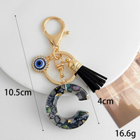 Porte-clés en résine Alphabet avec œil turc bleu, strass et pompon, breloque de sac à main, porte-clés personnalisé avec initiale, bijou fantaisie, cadeau