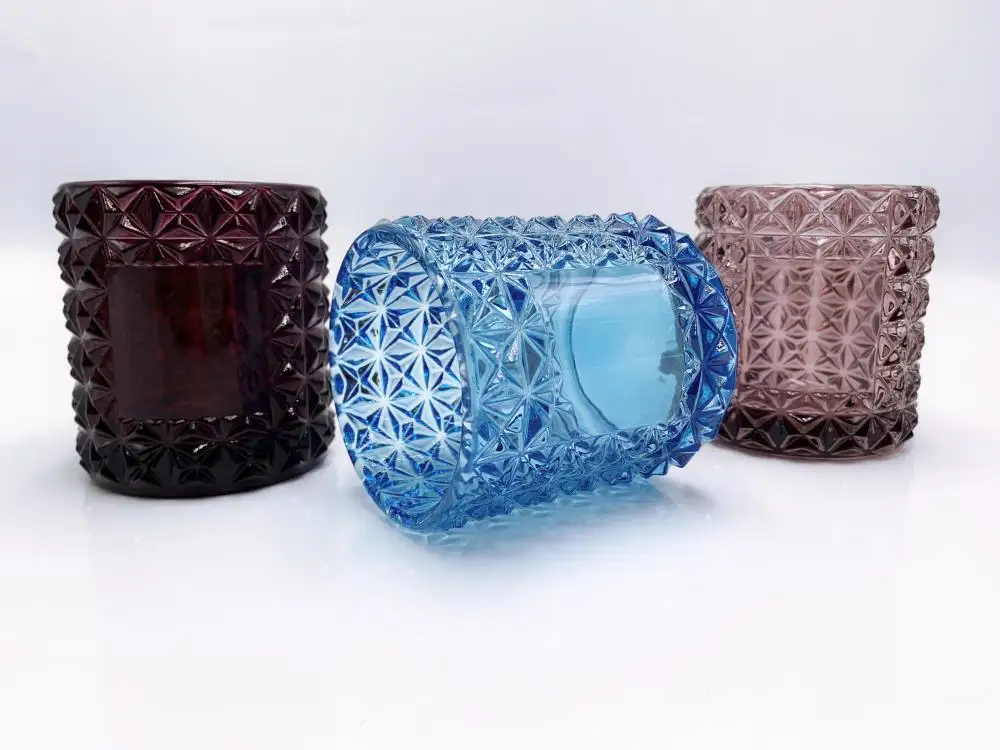 Hot sale embossed effect glass candle jar colored glassware
