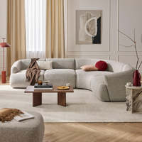 Canapé modulaire en tissu en forme de L, style moderne et luxueux, avec tissu bouclé pour salon d'appartement