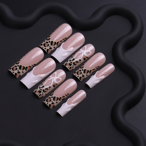 <span class=keywords><strong>Ongles</strong></span> à presser 3D French Tip, motif léopard, nœud papillon, forme cercueil longue, glamour pour soirée, certifiés OEM ODM MSDS, prêts à l'exportation - Product Image 2