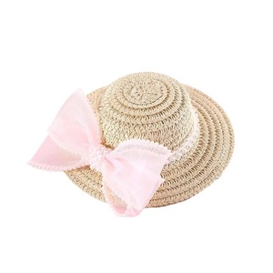 Hermoso sombrero de paja para niños con lazo de perlas, accesorio unisex para exteriores - Product Image 3