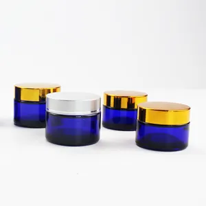 Frasco de crema de vidrio azul para envasado de cosméticos, tarro de crema de alta calidad de 30g, 50g, 100g, con tapa dorada brillante