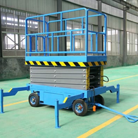 Ascenseur hydraulique en acier mobile type ciseaux aériens électriques 6m 8m 10m 12m plate-forme portative de ciseaux d'ascenseur pour l'extérieur