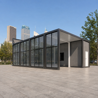 Bâtiment commercial préfabriqué en acier sur mesure, conteneur modulaire, atelier de réparation automobile, salle d'exposition avec mur-rideau en verre