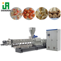 Automatische machine voor het maken van maïschips en andere snacks