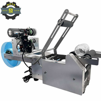 Étiqueteuse de bouteilles rondes portable de bureau semi-automatique MT-50, équipement d'étiquetage précis de 0,5 mm pour l'industrie alimentaire et des boissons