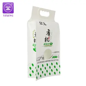 Yixing en çok satan özelleştirilmiş pirinç vakum ambalaj plastik ambalaj çanta için 500g 1KG 5KG pirinç veya buğday paketi kolu ile