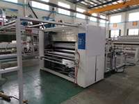 Machine de stratification à base de solvant et thermofusible PUR à vendre.