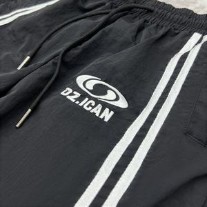 Pantalones Deportivos Personalizados con Botones Laterales, Pantalones Deportivos Holgados de Pierna Recta, Fabricante de Pantalones Deportivos Holgados a Rayas de Nailon para Hombre - Product Image 4