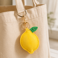 Porte-clés en cuir PU jaune en forme de citron, pendentif fruit 3D mignon, accessoire de sac à main, cadeaux de mode pour femmes et filles