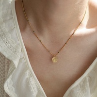 Bijoux tendance d'été plaqué or 18 carats en acier inoxydable boule perlée chaîne plante tropicale feuille palmier pendentif collier pour femmes