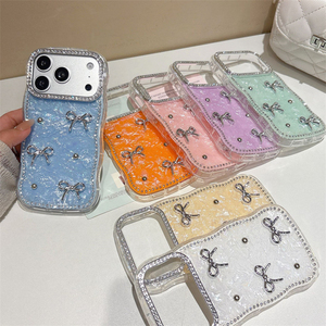 เคสโทรศัพท์ลายเปลือกหอยประดับเพชรทรงโบว์ สำหรับ iPhone 18 17 16 15 Pro Max  พื้นผิวเหลือบรุ้ง ลายคลื่นไล่เฉดสี - Product Image 1
