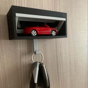Exhibición de Hot Wheels Impresa en 3D |   Llavero de Garaje para Coche con Forma de Puerta con Interruptor de Explosión |   Estante Moderno para Modelos de Autos, para Montar en la Pared - Product Image 1