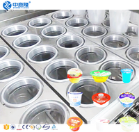 Machine linéaire de remplissage scellage automatique de yaourt de tasse en plastique de litchi d'eau/jus/crème glacée à prix d'usine de vente chaude