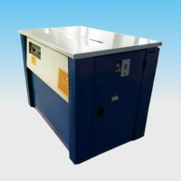 Machine à cerclage semi-automatique 006 pour table haute, haute tension 60 kg, pour emballage de cartons lourds et palettes avec bande PP