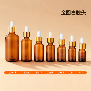 Botella de vidrio ámbar con gotero de 5ml 10ml 15ml 20ml 30ml 50ml 100ml con tapa dorada y gotero blanco para almacenamiento de aceites esenciales - Product Image 1