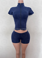 Ensemble de survêtement moulant 2 pièces pour femme : crop top à demi-zip et leggings capri, coupe ajustée, style sportif décontracté