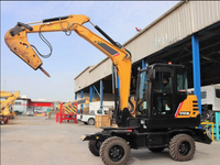 Excavatrice sur pneus de 6 tonnes SY65W, meilleur service, prix avantageux, à vendre