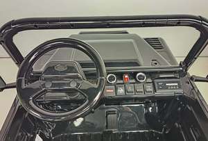 Coche Eléctrico Infantil con Licencia Oficial Land Rover Defender con Control Remoto 2.4G, 4 Motores, Camión Volquete Eléctrico para Niños y Niñas - Product Image 4