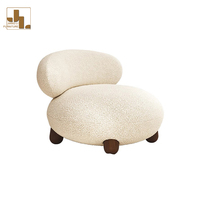 Chaise de canapé simple de salon nordique tissu en peluche blanc chaise de loisirs d'accent d'hôtel de luxe moderne avec pouf