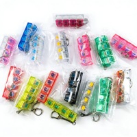 Porte-clés pendentif clavier en PVC haute transparence, rectangulaire, lumineux, à quatre touches, activé par pression, jouet anti-stress