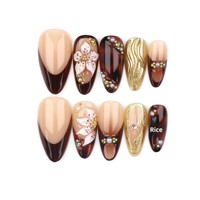 Vente en gros de faux ongles personnalisés, nouvelle collection 2026, plaqués or 3D, sculptés, forme amande, French manucure, en ABS, à presser