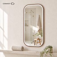 Miroir de salle de bain LED sur mesure avec cadre en bois, éclairage frontal, coins arrondis, capteur tactile, fixation murale