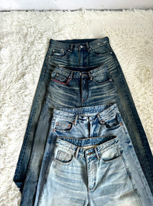 بنطلون جينز رجالي بقصة واسعة من الأسفل (Boot Cut) بخصر عالٍ، مناسب للصيف، بتصميم كاجوال، مع تأثيرات تآكل خفيفة وقماش أصلي متدرج اللون. - Product Image 2
