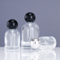 Emballage de bouteille vide personnalisé de 50ml 100ml bouteille de parfum en verre à fond épais vaporisateur bouteille de parfum ronde en verre avec bouchon sphérique