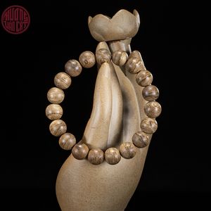 Pulsera Minimalista de Madera de Oud Malayo con Cuentas Redondas de 10 mm y Superficie Lisa, Joyería Elegante - Product Image 1