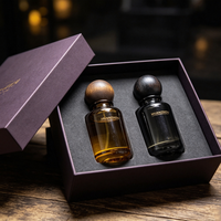 Flacon de parfum cylindrique de luxe vide en verre ambré ou noir personnalisé de 30 ml, 50 ml, 100 ml avec capuchon noir sérigraphié