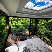 Hôtel modulaire de luxe moderne maison préfabriquée installation facile bateau-maison en verre étanche capsule spatiale de style design chinois