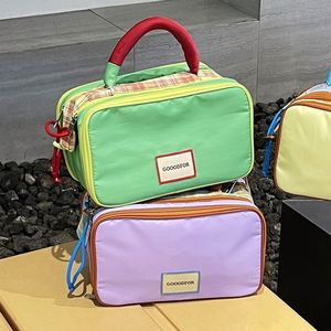 กระเป๋าเครื่องสำอางแฟชั่นไนลอนสีสันสดใส ขนาดกลาง พกพาสะดวก ใช้จัดระเบียบของสำหรับเดินทางและใช้งานประจำวัน - Product Image 2