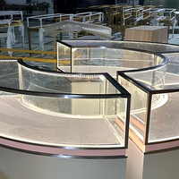 Vitrine à bijoux moderne de luxe rose personnalisée avec éclairage LED et comptoir en verre pour centre commercial